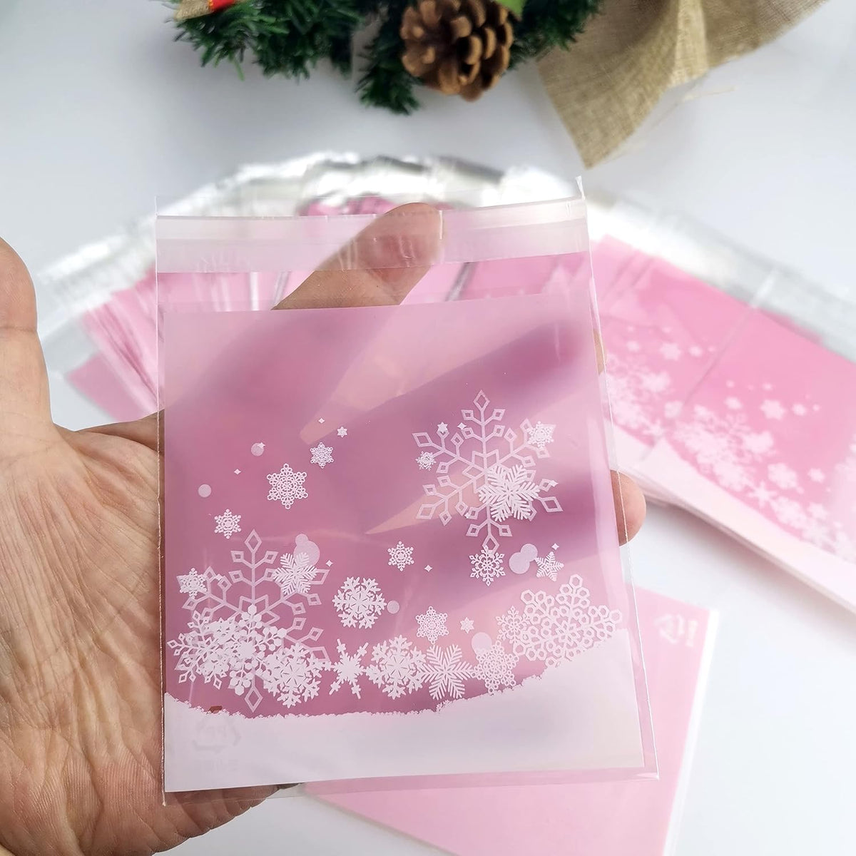 100 PCS Snowflake Cellophane Bags - Clear Self Sealing Pink Plastic Bags for Candy, Cookies & Goodies